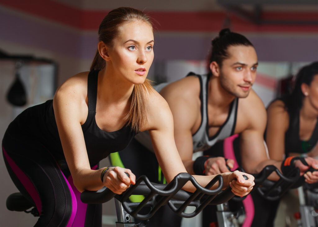 A group of young people during a spin class