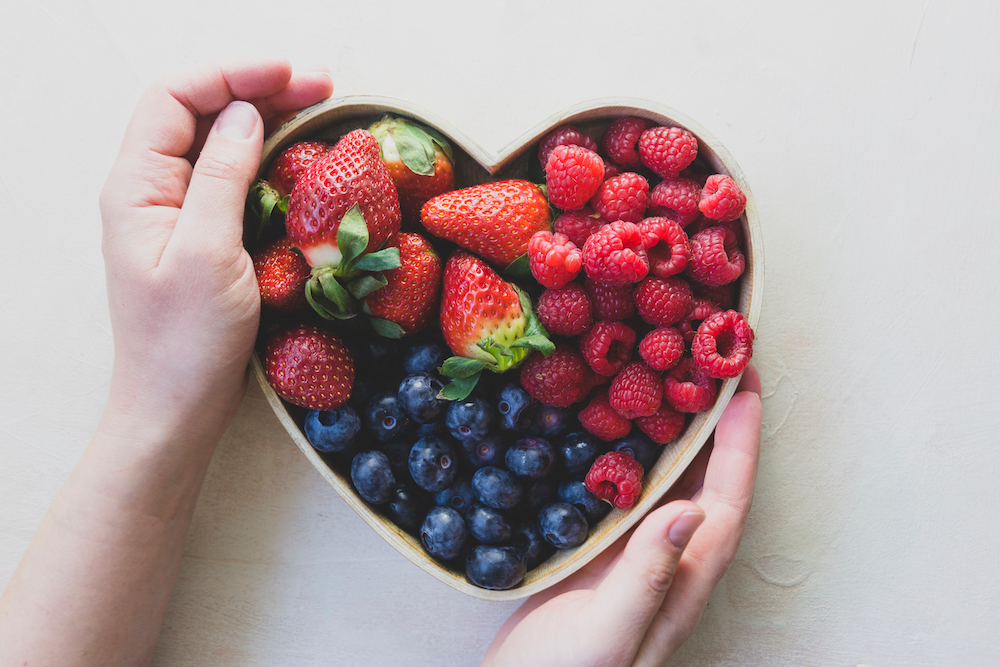 Berries in a heart-shaped bowl