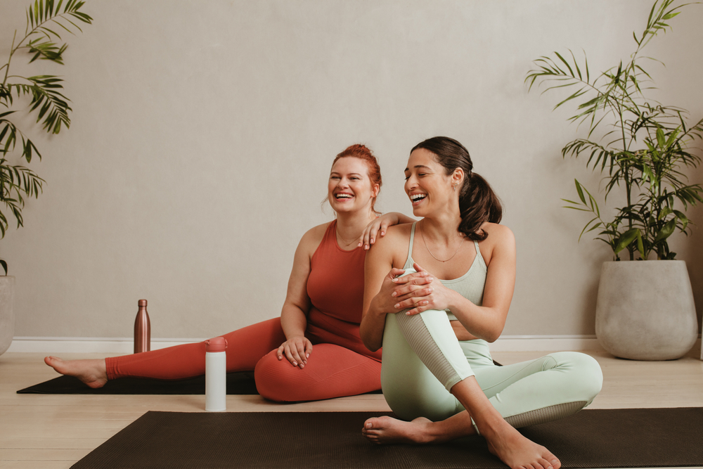 2 female friends relaxing after a yoga call at woodside