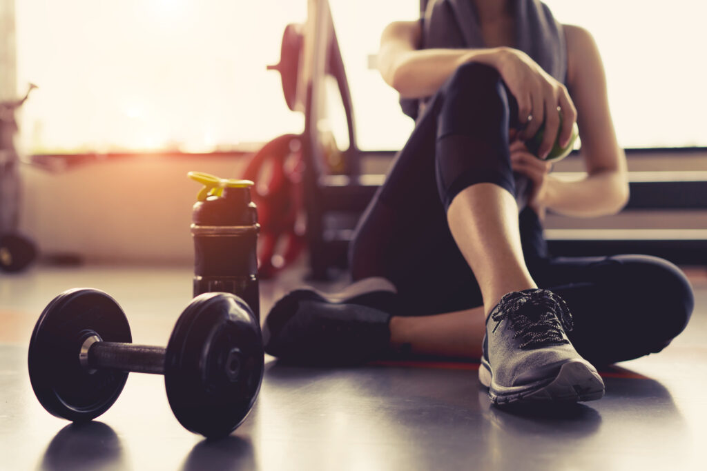 Woman exercising in KC wellness center.