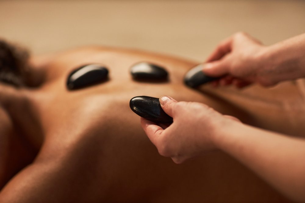 Hot stone therapy from massage therapists in Kansas City.